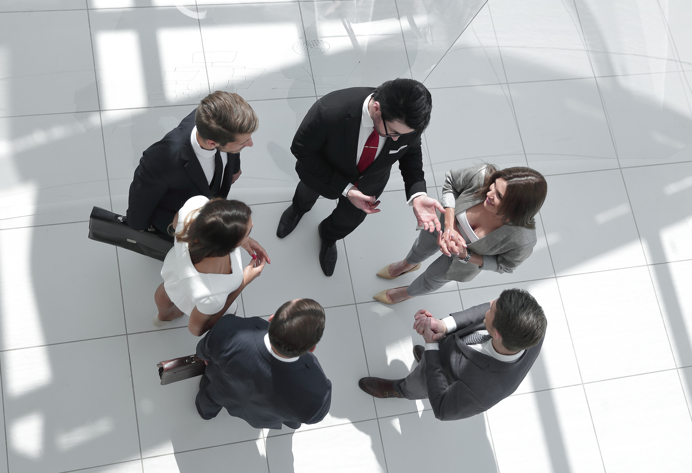 top view. employees discussing current tasks